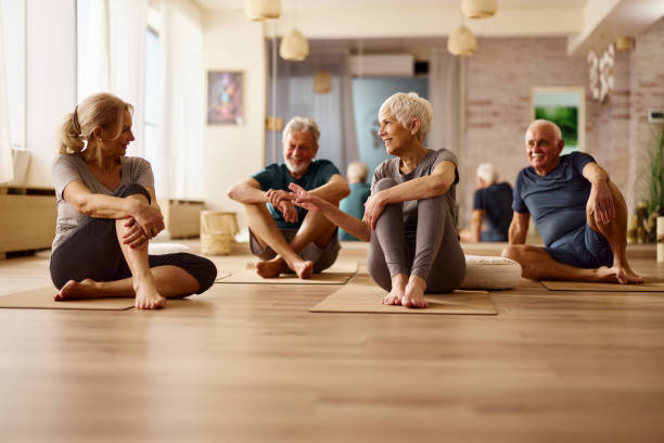 Seniors in yoga and fitness group session at HomeCare on Wheels Health Club
